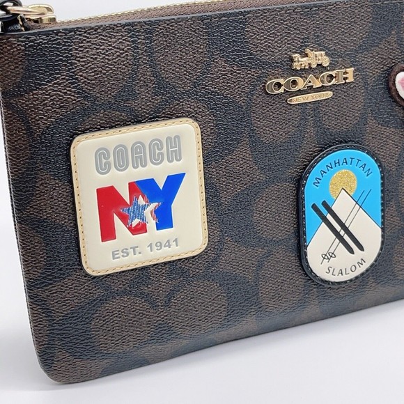 Coach CF457 Large Corner Zip Wristlet In Signature Canvas With Ski Patches NWT - Picture 4 of 7